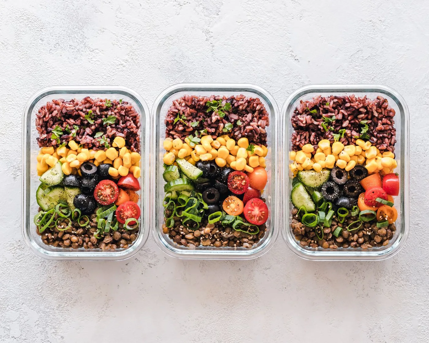 Prepared lunch portions in three divided containers
