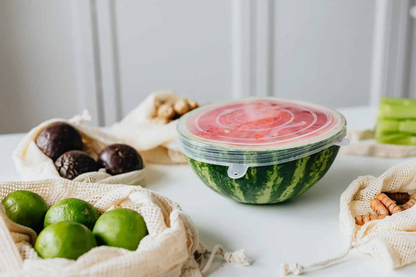 Cut watermelon protected with a reusable food cover